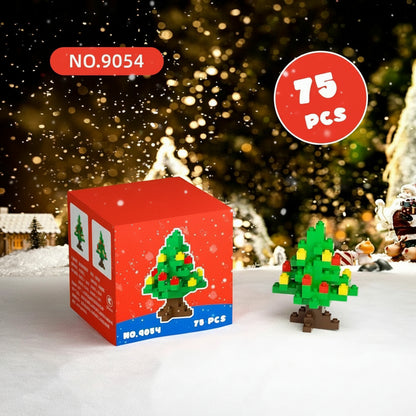 Red box of Christmas tree building blocks with a small model tree in front, set against a festive background.